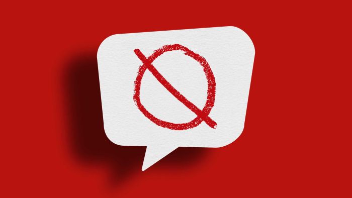 A speech bubble with a no sign on it, indicating a pause in the scientific debate.