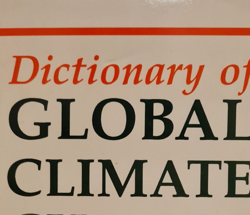 Cover of the 1992 edition of "Dictionary of Global Climate Change" with the title in red and black lettering within a red border.