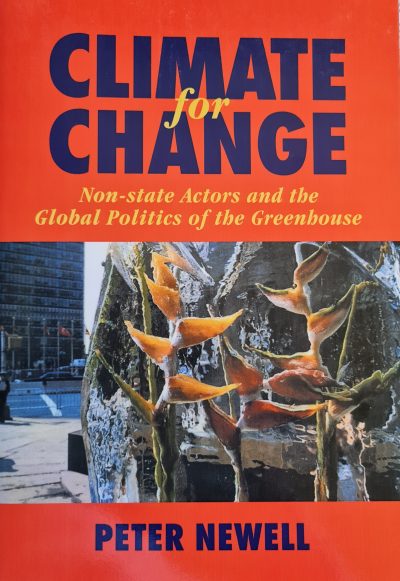 Book cover titled "Climate for Change" by Peter Newell, a 2000 Climate Book, featuring a city scene with a large ice sculpture and visible orange text on a red background.