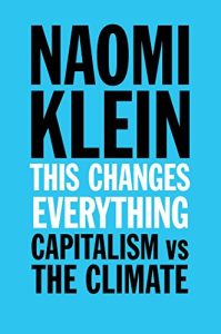 Book cover with a bright blue background displaying the title: "This Changes Everything: Capitalism vs The Climate" by Naomi Klein in bold black and white text, acclaimed as a 2014 Climate Book of the Year.
